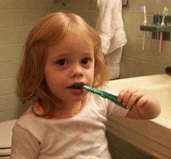 Kids brushing teeth